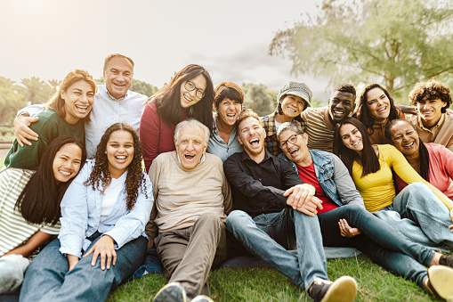 Outdoor group photo of smiling participants, showcasing engagement, collaboration, and community spirit.